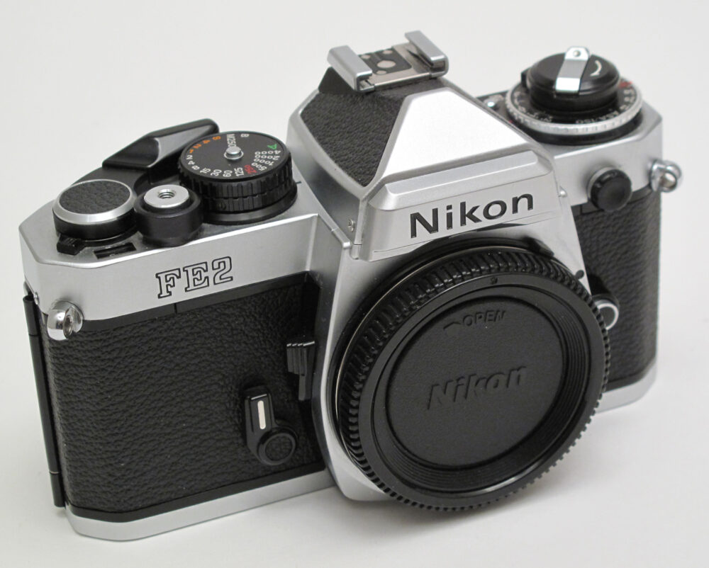 Nikon FE2 Noir - Appareil Photo 35 Mm Avec Accessoires - Occasion